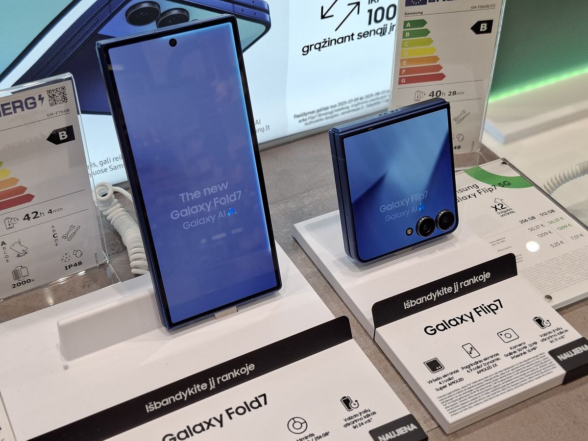 A folded Samsung Galaxy Z Fold 7 and Z Flip 7 displayed on stands in a phone store